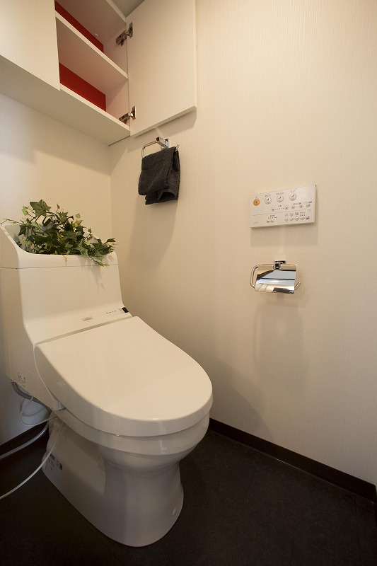 省エネを実施する超節水+ecoボタンを装備したトイレ（201号室）